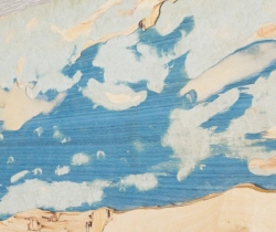 Wooden artwork with blue paint in the grain